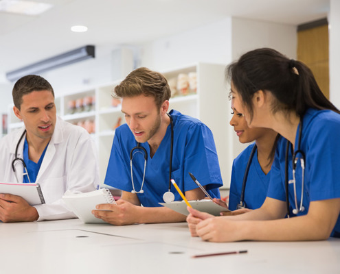 Medical Students Sitting And Talking